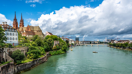 Basel panoramic cityscape with Rhine river view colourful old town and industrial buildings in...