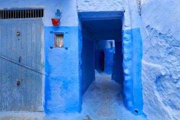 View of the blue walls of Medina quarter in Chefchaouen, Morocco. The city, also known as Chaouen is noted for its buildings in shades of blue and that makes Chefchaouen very attractive to visitors.