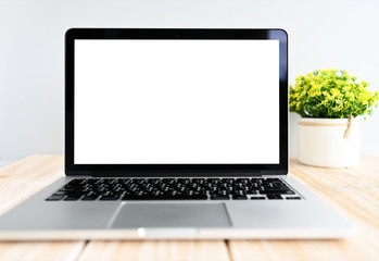 Fototapeta premium mockup screen Modern laptop computer on wood table in office view backgrounds