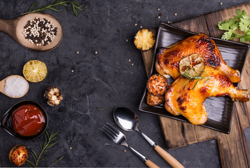 Baked or Grilled Chicken Wings Where the chef cooks meticulously appetizing with spoons and forks...