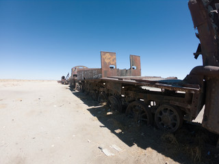 rusty steam locomotive near Uyuni in Bolivia. Cemetery trains.