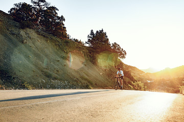 Cyclist riding on his bicycle at coastal road