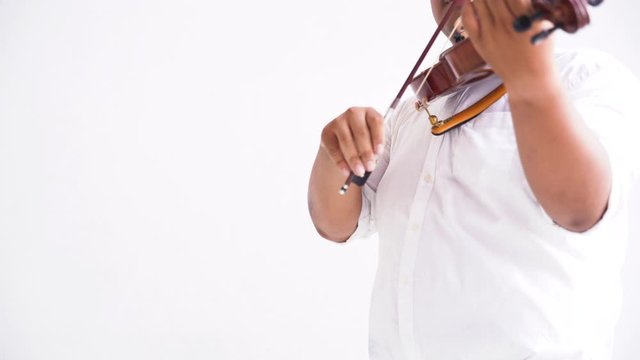 Symphony Orchestra On White Background, Hands Playing Violin. Male Violinist Playing Classical Music On Violin. Talented Violinist And Classical Music Player Solo Performance.