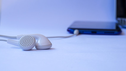 microphone and headphones on white background