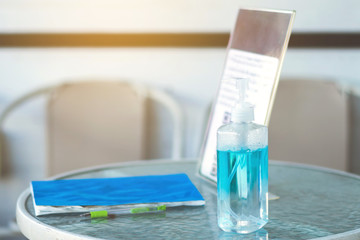 Blue alcohol gel bottle for hand cleaning to prevent the spreading of the Coronavirus (Covid-19) to...