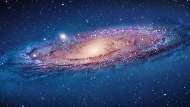 Video of universe or aerial flyby. Camera moves towards galaxy like milky way while stars flyby. Apt for motivational, meditation, intro or opener, music and spiritual videos.