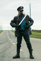 Young man weared in steampunk style