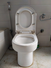Close up shot of open toilet seat