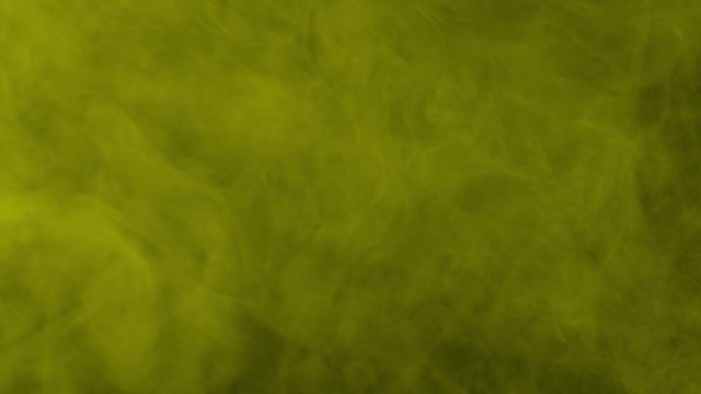 Atmospheric smoke VFX overlay element. Haze background. Smoke in slow motion on black background. White smoke slowly floating through space against black background. Mist effect. Fog effect.
