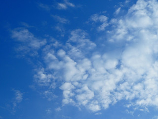 Obraz premium The blue sky with white clouds background and texture