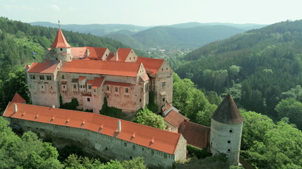 Aerial View of Fairytale Pernstejn Castle in Forest on a rock in Czech Republic