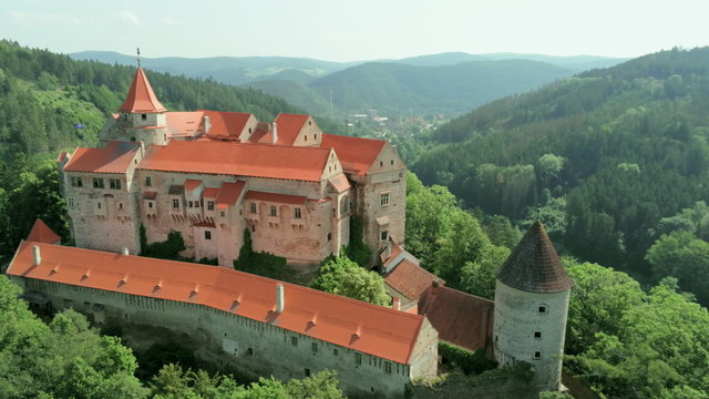Aerial View of Fairytale Pernstejn Castle in Forest on a rock in Czech Republic