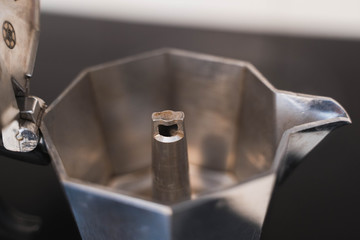 making coffee in Italian moka pot coffee maker