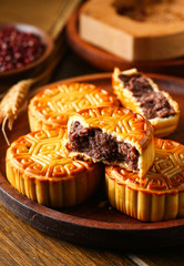 Chinese traditional mid autumn festival moon cake in wooden plate