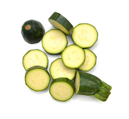 green zucchini vegetables isolated on white