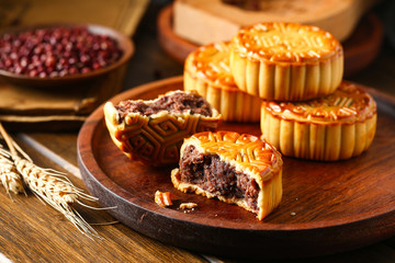 Chinese traditional mid autumn festival moon cake in wooden plate