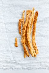thin baguettes on a light background