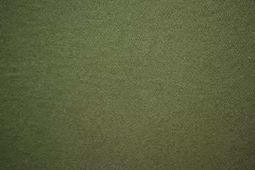 Behangcirkel Olive green cotton vintage military fabric cloth texture © Milovan Zrnic