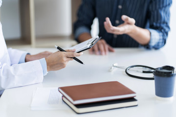 Fototapeta premium Medicine doctor consultant explaining to patient about problem diagnosis.