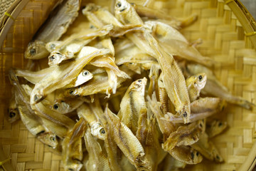 Dried anchovies in the bamboo wicker are a great food preserve