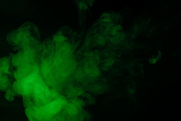 Green steam on a black background.