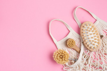 Eco-friendly kitchen accessories on pink background. The concept zero waste and our planet.