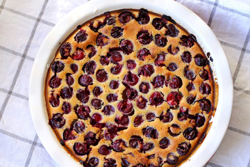 Homemade baked cherry clafoutis. Close-up cherry pie