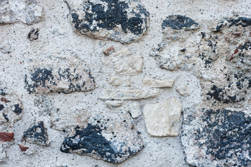 texture of a stone wall of an old building, ancient architecture.