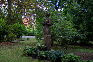 Monument to a Nurse and Midwife in Wroclaw, in Poland. The monument depicts a young girl with a...