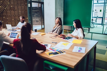 Group of young workers meeting at design office