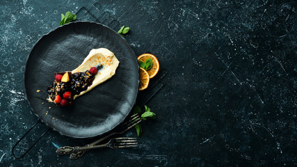 Marmalade dessert with berries and cream. Top view. Free space for text.