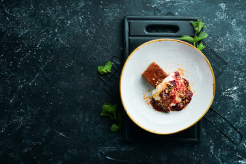 A piece of cake with fruit and cream. Top view. Free space for text.