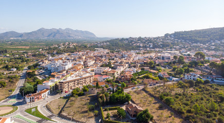 Fototapeta na wymiar Aerial view of Orba village in Alicante, Spain. Segaria mountain and Mediterranean Sea is in the background.