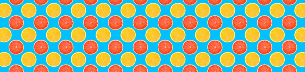 Fototapeta premium Pattern of fresh fruits isolated on creative colored texture