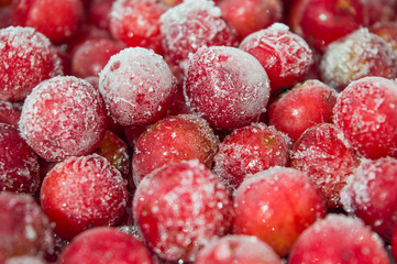 Frozen red cherries. Frost-covered berries. Frost-covered cherries. Red cherry.