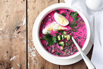 Cold beetroot soup with cucumber, egg and herbs.