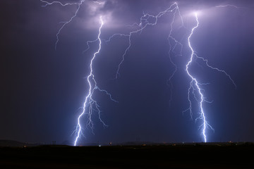 Twin lightning bolt strikes in a thunderstorm