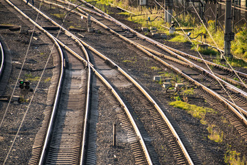 Fototapeta na wymiar Railroad tracks of the station with wagons.