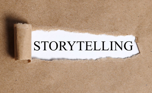 Tell your story text under torn paper. Storytelling marketing business promotion concept.