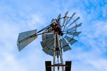 Old windmill with a new wind turbine 