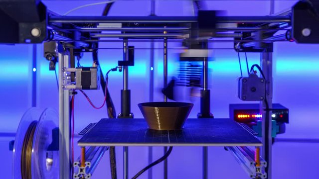 Working 3D printer, printing a plastic vase   Time lapse video