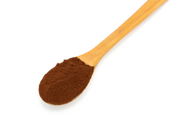Wooden spoon with coffe powder