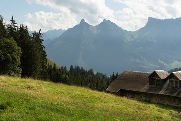View on Dent de Broc mountain and old Swiss farm, Switzerland 
