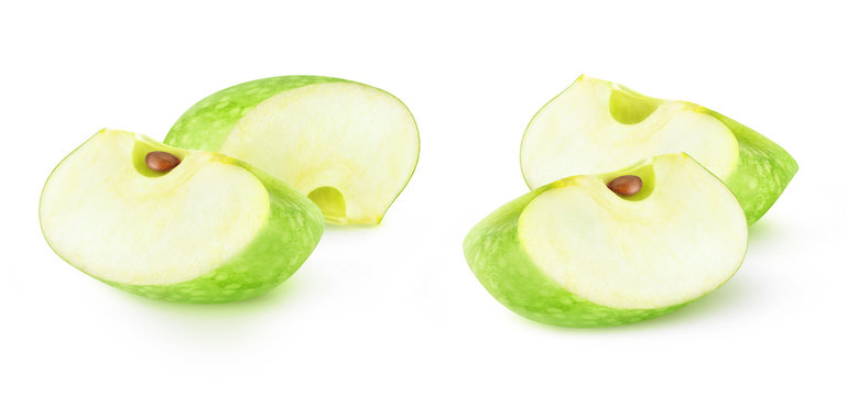 Isolated apple wedges. Two slices of green Granny Smith apples isolated on white background