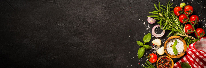 Food cooking background at black top view.