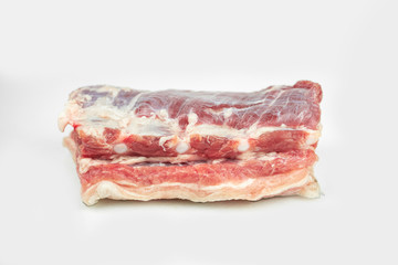 piece of fat pork ribs, raw meat, isolated on white
