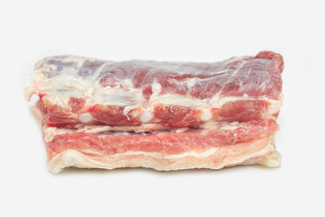piece of fat pork ribs, raw meat, isolated on white