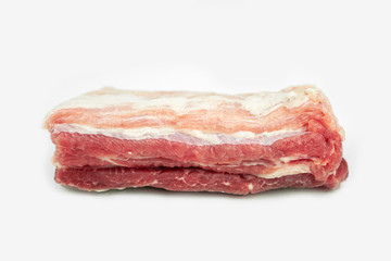 piece of fat pork ribs, raw meat, isolated on white