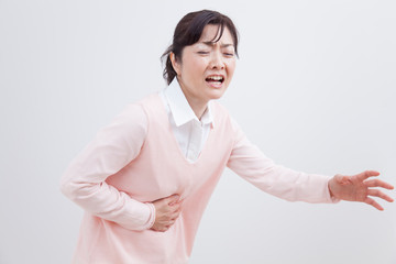 腹痛のミドル女性