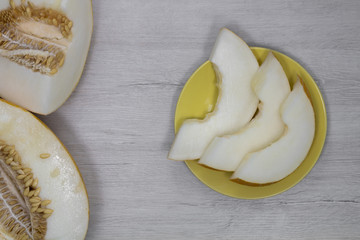Sliced melon. Juicy melon pulp. Yellow melon.